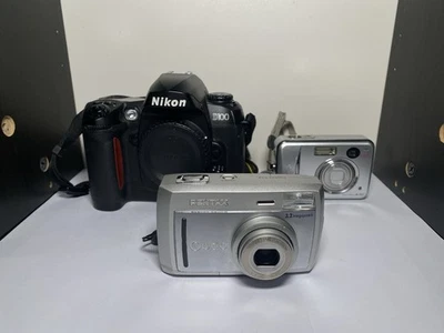 Lot Of 3 Broken Cameras For Parts Only Nikon Pentax Fujifilm - Image 1 of 4