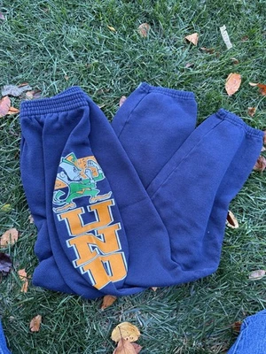 Pantalones deportivos vintage para niños medianos Notre Dame puño irlandés de lucha azul marino EE. UU. Foto 1 de 4