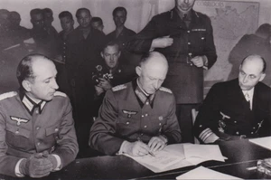 1965 Press Photo WWII German Col. Alfred Jodl Signs Surrender in France in 1945 - Picture 1 of 2