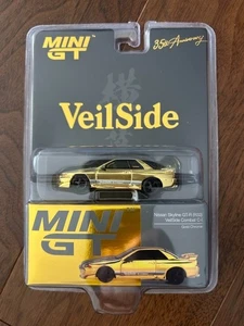 Mini GT VeilSide Nissan Skyline GT-R R32 35th Combat C-I gold chrome 1/64 NEU - Bild 1 von 2