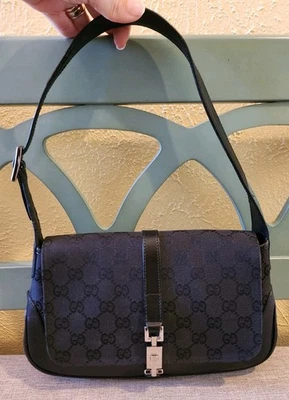 Винтажная кожаная наплечная сумка Gucci Jackie 1961 года эпохи Tom Ford с монограммой и поршневым замком - Изображение 1 из 4