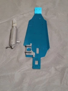 VINTAGE DURATRAX NITRO EVADER CHASSIS NEW WITH MOTOR MOUNT PIPE HAS SHELF WEAR - Picture 1 of 13