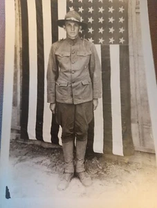 WW1 Young American soldier in front of flag RPPC postcard a20 - Picture 1 of 2