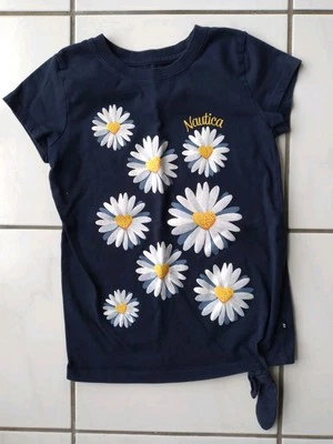 Camiseta Nautica Niñas Talla 8 Azul Marino con Estampado Margarita y Corbata Frontal Foto 1 de 3