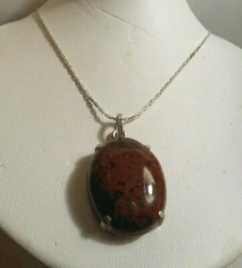 Silver tone chain necklace with a mahogany colored acrylic oval pendant - Picture 1 of 6