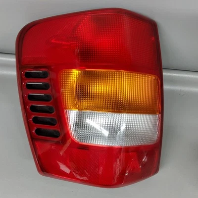 Conjunto de luz trasera lateral izquierda para conductor Jeep Grand Cherokee 99-04 Foto 1 de 4