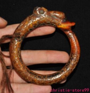 China amber Carved fengshui loong Dragon hook exorcism bracelet hand ring statue