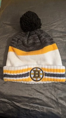 Boston Bruins NHL Reebok Sombrero Tejido con Puños Negro Dorado Blanco Sombrero de Invierno  Foto 1 de 4