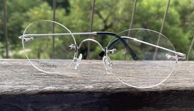 Marco de gafas redondo para hombre titanio plata gafas estilo Steve Jobs Foto 1 de 4