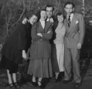 1950s Friends Hugging Laughing Group Portrait Joyful Outdoor Moment - Picture 1 of 3
