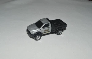 Matchbox 2024 MBX CONSTRUTION III - EXCLUSIVO 2016 RAM PLATAFORMA PLANA PLATA SUELTA - Imagen 1 de 8