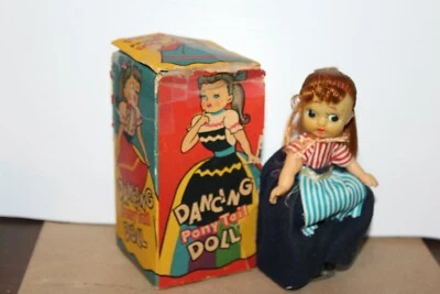  NICE VINTAGE WIND UP  DANCING PONY TAIL GIRL in PARTIAL BOX - Image 1 of 4