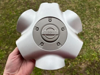 TAPA CENTRAL RUEDA NISSAN PATHFINDER OEM 2 TONOS 40342 2W600 1999 2000 2001 2002 Foto 1 de 3