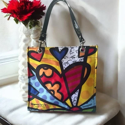 Bolso de Mano Pequeño Romero Britto, Diseño Corazón “Un Nuevo Día”, Multicolor Foto 1 de 4