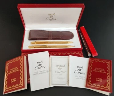 Vintage MUST de CARTIER gold ballpoint pen & Mechanical pencil SET W/ Refills - image 1 of 4