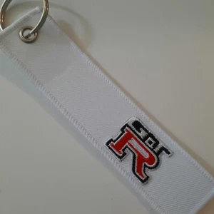 Portachiavi Nissan GT R Tessuto Bianco - Regalo Passione Auto Estetica - Foto 1 di 1