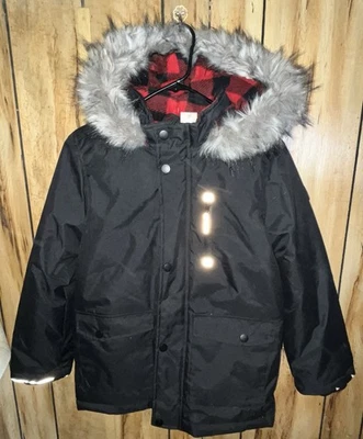 Chaqueta de invierno Canadiana para niños talla 10/12 negra con capucha de piel sintética Foto 1 de 4