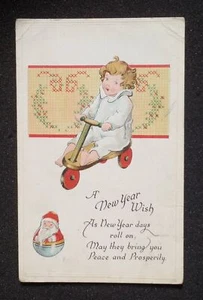 1920 New Years Greeting Christmas Santa Roly-Poly Child on Wooden Tricycle PC - Picture 1 of 1