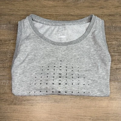 Camiseta sin mangas Nike Dri-Fit unisex talla (XL) gris mezcla de algodón con emblemas dorados B17 Foto 1 de 4