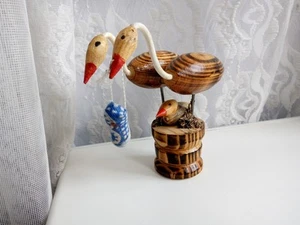 Vintage wooden figurine of a stork with a baby, handmade wooden stork - Picture 1 of 9