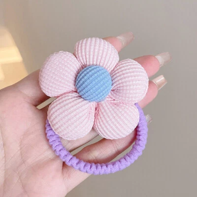 Cuerda de cabeza de color de empalme cuerda de pelo de flor grande tejida flor cola de caballo corbata para el cabello Foto 1 de 4