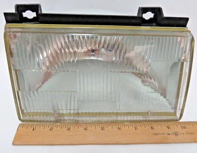 Faro derecho Ford Tempo 1988 con bisel usado Foto 1 de 4