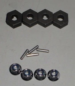 TRAXXAS T-MAXX 2.5 E MAXX 14 MM HEX HUBS WHEEL NUTS PINS - Picture 1 of 1