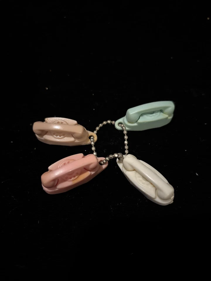 Vintage Lot Of 4 Bell Telephone Plastic Promo Princess Phone Key Chains. - Image 1 of 1