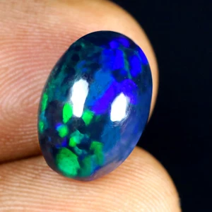 3.50 ct Incredible Oval Cabochon (14 x 10 mm) Ethiopian Flashing Black Opal - Picture 1 of 1
