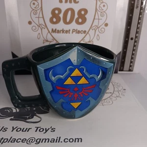 Taza de té de café Nintendo Paladone The Legend Of Zelda Hylian Shield 2015 - Imagen 1 de 5