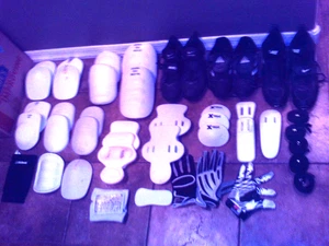 YOUTH FOOTBALL CLEATS & PADS & JERSEY & GLOVES & BELTS & ARM BANDS & BAG LOT - Picture 1 of 24