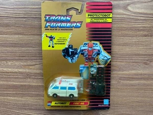 Transformers G1 1990 First-Aid Defensor classic gold MOSC Europe MB hasbro - Picture 1 of 4