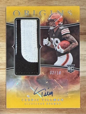 2023 Panini Origins Cedric Tillman Rookie Jumbo Jersey Autographs Gold /10 RPA - Image 1 of 2
