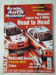 MODELLAUTO SCALE Nr.2 Bj 2000 Mitsubishi Lancer Evo V WRCs Porsche 962C - Bild 1 von 2