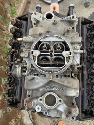 Engine Intake Manifold / Carburetor Edelbrock/ Engine Stand Included - Image 1 of 4