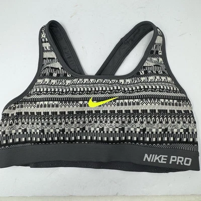Sujetador deportivo Nike Pro Dri-Fit gris a rayas geométricas para mujer talla pequeña Foto 1 de 3
