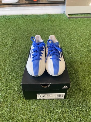 adidas Junior X Speedflow.3 FG Soccer Cleats - White/Blue - Image 1 of 4