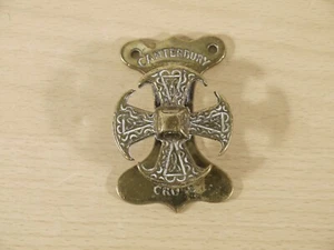 Antiguo llamador de puerta de latón pequeño Canterbury Cross 6,5 cm de longitud en muy buena condición - Imagen 1 de 10