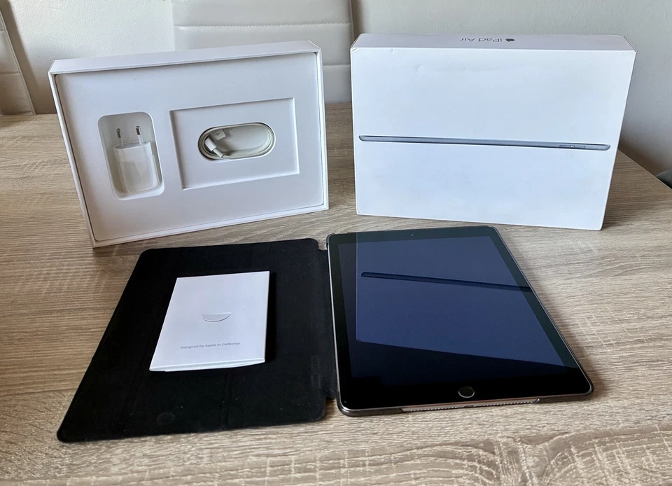 Apple iPad Air 2 Wi-Fi + 4G with Original Charger & Case – Good Condition - Imagen 1 de 4
