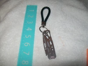 LLAVERO CUCHILLO DE BOLSILLO ESQUELETO DE BUCLE TRENZADO, LLAVERO-7" DE LARGO - Imagen 1 de 4
