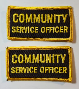 (2) Parche bordado OFICIAL DE SERVICIO COMUNITARIO | Rectángulo | Dorado Negro - Imagen 1 de 5