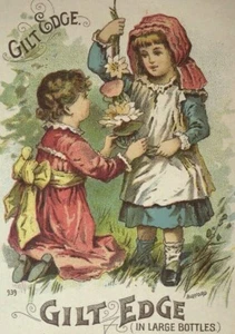 Tarjeta comercial de niñas estilo acebo brillo zapato borde dorado Whittemore Bros de la década de 1880 - Imagen 1 de 3