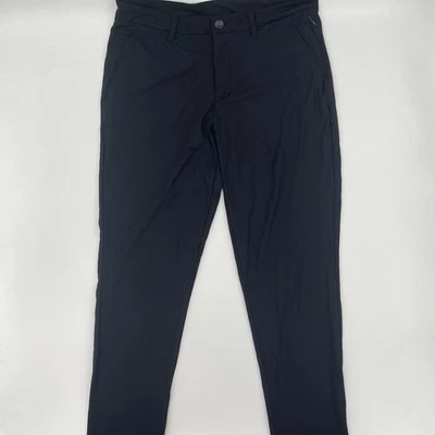 Pantalones de golf Reebok para hombre 34x32 negros ligeros deportivos informales bolsillo con cremallera Foto 1 de 4