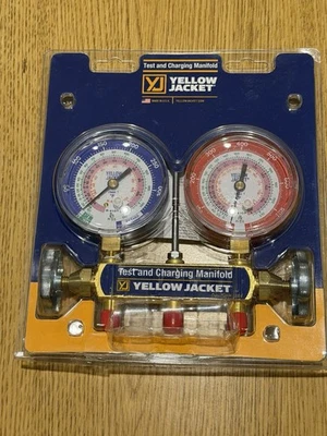 Colector de prueba y carga de chaqueta amarilla Foto 1 de 2