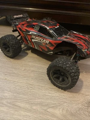 Traxxas Rustler 4x4. Upgraded Motor, Servo, Shocks, And Front And Rear Axles.￼ - Image 1 of 4
