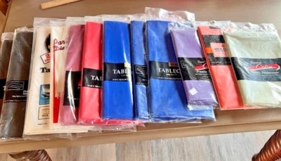 New Old Stock Plastic Tablecloths Touch of Color Lot of 12 Assorted Disposable - Image 1 of 4