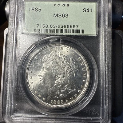 Dólar de plata Morgan 1885 MS63 PCGS soporte verde antiguo (OGH) - Envío gratuito Foto 1 de 4