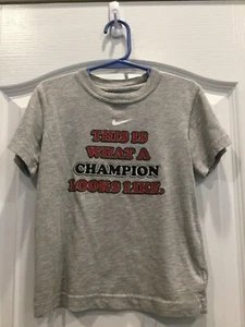 Nike Boys Graphic T Shirt Size 4 Graphic This is What a Champion Looks Like 215 - Picture 1 of 10