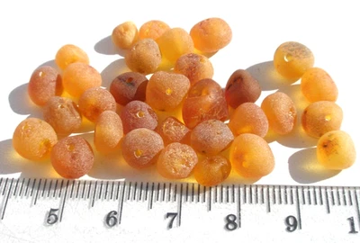 REAL RAW BALTIC AMBER , HOLED ROUND 30 BEADS (0,19 - 0,27 inches - DIY) Caramel - Image 1 of 4