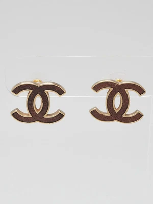 Aretes Chanel de metal dorado de cuero CC Foto 1 de 3